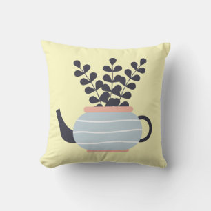 Simple modern teapot with plant pastel cushion