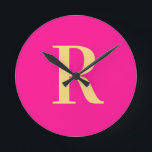 Simple Monogram Modern Hot Pink Round Clock<br><div class="desc">This is a simple, modern, personalised monogram design. This stylish design is in trending hot pink with stylish typography. It's perfect for a personalised gift or ideal as a new home decor accessory for yourself. Simply add your initial letter by typing it into the personalise this text box. Check out...</div>