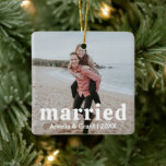 Simple Photo Modern First Christmas Married Ceramic Ornament<br><div class="desc">Modern style Christmas ornament featuring a simple and minimal layout with "married" in a groovy retro font along with your names and year over your favourite wedding photo. This ornament makes a great gift for a newlywed couple for their first Christmas married.</div>