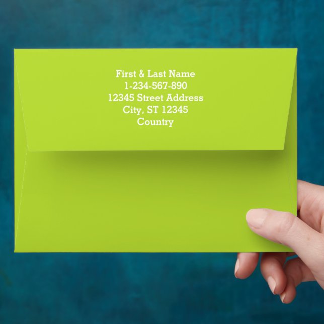 Simple plain solid colour bright acid green lime envelope (Hand)