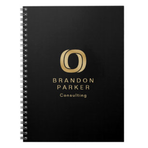 Simple Professional Gold Business Logo on Black Notebook