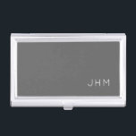 Simple Professional Grey Classic Monogram Business Card Holder<br><div class="desc">Professional business card holder features sleek simple minimalist design in a grey colour palette with white accents. Custom monogram initials presented on a simple grey background; positioned lower right hand corner. Shown with personalised monogram initials in a simple classic modern font, this executive business card holder is designed as a...</div>