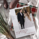 Simple Red Plaid Married & Merry Newlyweds Photo Holiday Card<br><div class="desc">Introducing our stunning new Simple Red and Green Tartan Plaid Married and Merry Newlyweds Photo Holiday Card: a modern design featuring elegant typography and a cherished wedding photo, in festive red and white. The minimalistic front is complemented by a warm, festive , with a red and green tartan plaid on...</div>