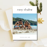 Simple Script Beach Christmas Photo Card<br><div class="desc">Share the warmth of the coast this holiday season with a heartfelt beach Christmas photo card. Ideal for families who cherish seaside moments,  this elegant design brings a touch of ocean calm and modern script to capture the joy of a tropical-inspired Christmas greeting.</div>