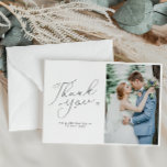 simple script black and white wedding photo thank you card<br><div class="desc">A modern simple wedding thank you card with a wonderful black script and a personalised photo of the bride and groom.  Add a personal thank you message to your guests.</div>