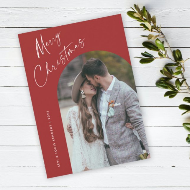 Simple Script Boho Arch Christmas Holiday Card (Simple script boho arch photo Christmas holiday card with modern elegant handwritten typography.)