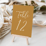 Simple Script Ochre Wedding Table Number<br><div class="desc">Elegant wedding table numbers featuring the table number displayed in a simple white script with a ochre background. The text and background colours can be changed to your wedding colours using the editing tools. To order these table cards, individually edit the card with the number and add it to your...</div>