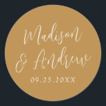 Simple Script Personalised Ochre Wedding Classic Round Sticker<br><div class="desc">Elegant wedding stickers featuring your names in a white script with an ochre background. Personalise the simple wedding stickers with your wedding date. Design coordinates with our Simple Script wedding collection.</div>