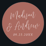 Simple Script Personalised Rust Wedding Classic Round Sticker<br><div class="desc">Elegant wedding stickers featuring your names in a white script with a rust background. Personalise the simple wedding stickers with your wedding date. Design coordinates with our Simple Script wedding collection.</div>