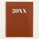 Simple terracotta modern typography year monogram planner<br><div class="desc">Minimalist terracotta and white modern typography custom simple elegant Planner.
Custom white serif text,  terracotta solid plain background.
You can personalised it with your name,  initials,  monogram,  year,  etc or just delete the text,  and leave the black solid plain black colour.</div>