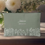Simple Wildflower Sage Green Wedding Bridesmaid Accessory Pouch<br><div class="desc">Wildflower wedding gift for anyone in your bridal party. Easy to personalise for your bridesmaids, the mother of the bride, mother of the groom etc and you can also add the name of the bride and groom and their wedding date. Simple and elegant boho floral design with line drawn wildflowers....</div>