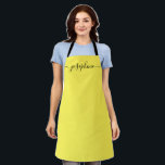 Simple Yellow black Chic Elegant Name Script Apron<br><div class="desc">Simple Yellow Black Chic Elegant Name Script Apron Brighten Her Culinary Journey: This vibrant yellow apron adorned with a beautifully contrasting black script isn’t just a garment; it’s a cheerful companion to her baking, cooking, or gardening endeavours. The personalised name, scripted in elegant long-tail embellishments, brings a chic and elegant...</div>
