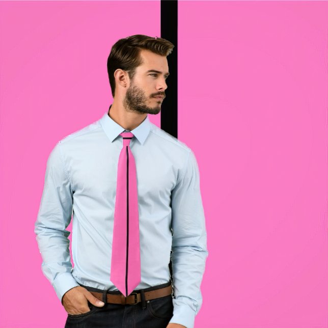 Single Black Stripe on Hot Pink Tie (Man wears a hot pink necktie featuring a thin single black stripe. Background matches tie.)