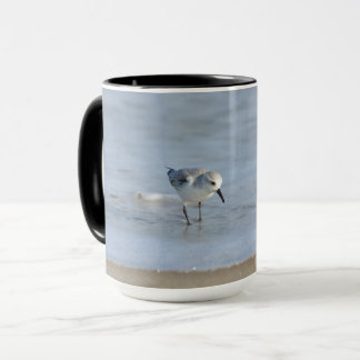 Single Sandpiper walking on beach  Mug