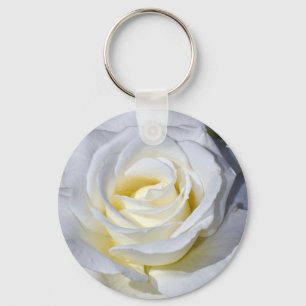 Single white rose blossoms key ring