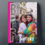 Sisters and Best Friends Forever Photo Magenta Plaque<br><div class="desc">This Sisters and Best Friends Forever Photo Magenta table top plaque would make modern, unique and heartfelt gift. Perfect for Birthdays, Christmas, graduations and in memoriam gifts. It is designed to look like one seamless full-bleed photo — with bold white outline “BFF” lettering subtly bleeding out of a clean magenta...</div>