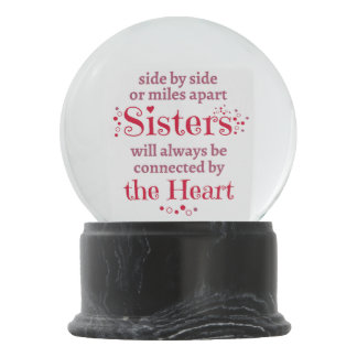 sisters will always connected by the heart snow globe