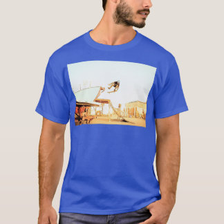 skater extreme stunt using skateboard in extreme o T-Shirt