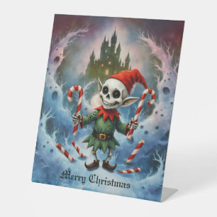 Skeleton Christmas Elf – Creepy Cute Dark Holiday Pedestal Sign