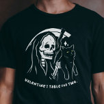 Skeleton Grim Reaper Holding Cat Funny Cat Lover T-Shirt<br><div class="desc">Celebrate the single life this Valentine's Day. It's the ultimate funny and sarcastic nod to solo celebrations. As a proud cat mum or cat dad, this ironic shirt is your ticket to a purrfectly rebellious Valentine's. Embrace the humour, revel in the irony, and wear your single status with pride. It's...</div>