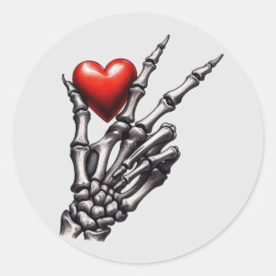 Skeleton Hand Displaying Red Heart Sticker