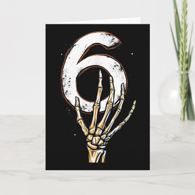 Skeleton Hand Holding Number 6 Matching 67 Hallowe Card (Front)