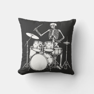 Skeleton plays the drums in rock band cushion