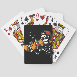 Skeleton With a Bottle on a set of Playing Cards