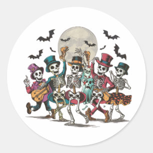 Skeletons and ghosts dancing under a full moon classic round sticker