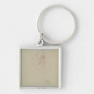 Sketch of a male head and two legs key ring