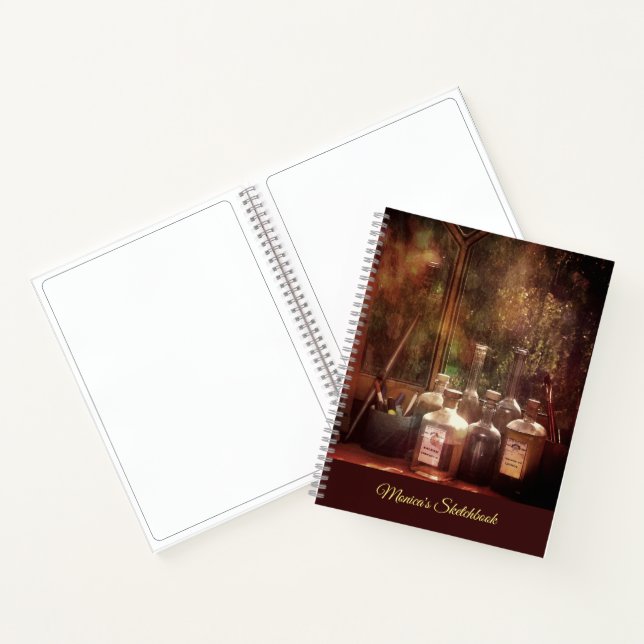 Sketchbook with your name or any other text notebook (Inside)