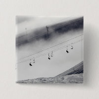 Skiers on a chair lift