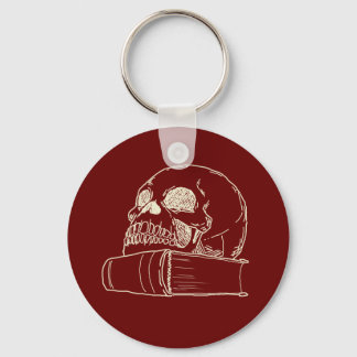 Skull and a book key ring
