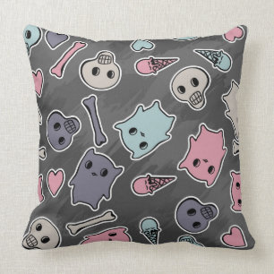 Skulls, and hearts on black background cushion