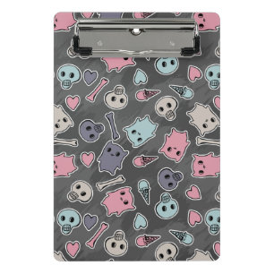 Skulls, and hearts on black background mini clipboard