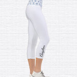 Sky & Clouds Om Symbol High Waisted Capri Leggings<br><div class="desc">Blue Sky White Clouds Om symbol is tiled on the waistband, the capri leggings are tinted blue. Name in black on outside of right calf. Easily change or remove name using the Template provided. There is ample room for a full name or other text. Sizes from XS (0-2) to XL...</div>