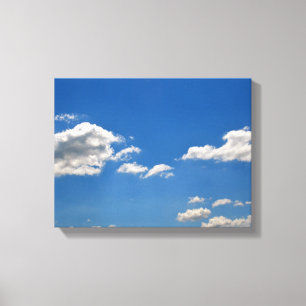 Sky is blue and white clouds are passing by canvas print
