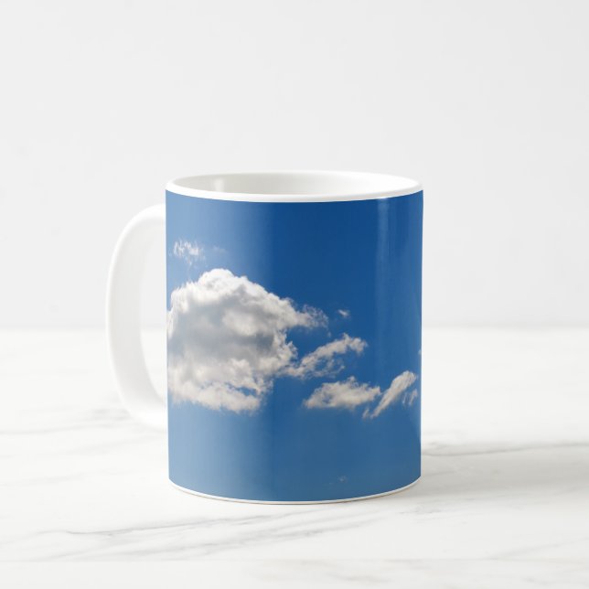 Sky is blue and white clouds are passing by  coffee mug (Front Left)