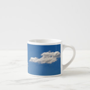 Sky is blue and white clouds are passing by espresso cup