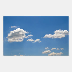 Sky is blue and white clouds are passing by   rectangular sticker