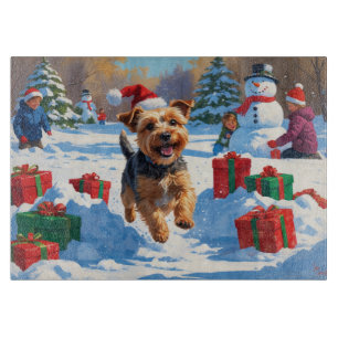 Skye Terrier Running in Snow with Christmas Hat Cutting Board