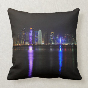Skyline of Doha, Qatar at night throw pillow
