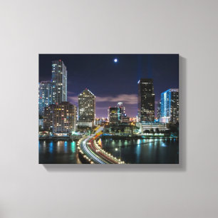Skyline of Miami city with bridge at night Canvas Print