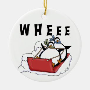 Sledding Penguins Holiday Ornament