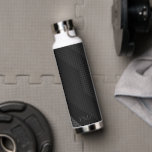 Sleek Black Geometric Initials Sports  Water Bottle<br><div class="desc">Sleek Black Geometric Initials Water Bottle This design features a bold black-on-black design with layered geometric shapes, subtle texture, and personalized initials for a clean modern look. The dark tonal palette gives it a polished, minimalist style that feels sporty, masculine, and sophisticated. It would make a great gift the man...</div>