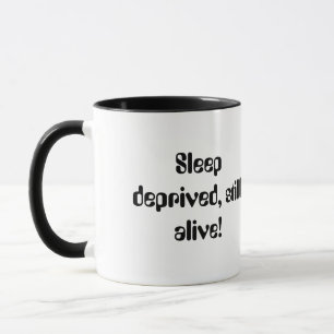 Sleep deprived,still alive! mug