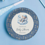 Sleeping bear cloud & stars blue boy baby shower paper plate<br><div class="desc">Celebrate the arrival of your little one with this charming paper plate featuring a watercolor baby bear peacefully sleeping on a cloud. The cute illustration is encased in a circular frame, surrounded by a delightful pattern of golden stars against a serene blue backdrop. Perfect for adding a touch of whimsy...</div>