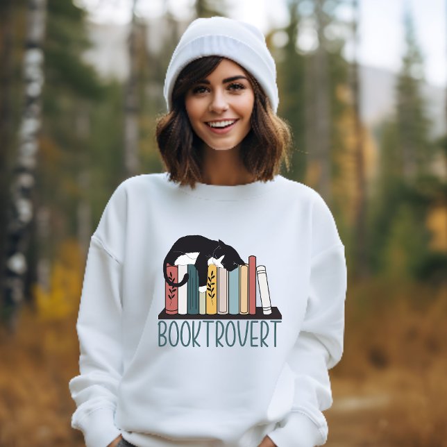 Sleeping black white cat on bookshelf booktrovert sweatshirt (Creator Uploaded)