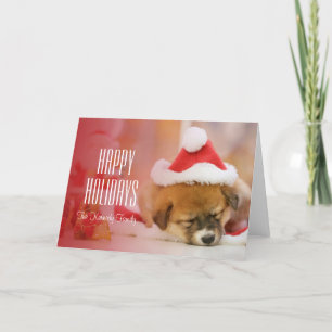Sleeping puppy wearing a Santa hat Holiday Card