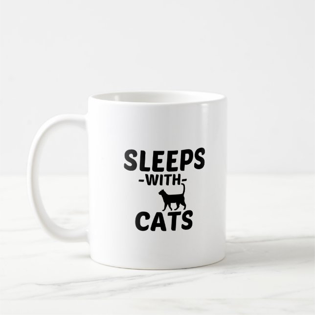 SLEEPS WITH CATS COFFEE MUG (Left)